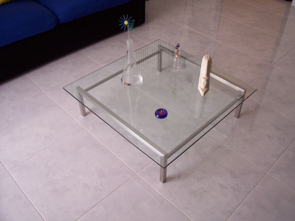 tavolino da salotto in stile moderno in acciaio inox satinato e cristallo